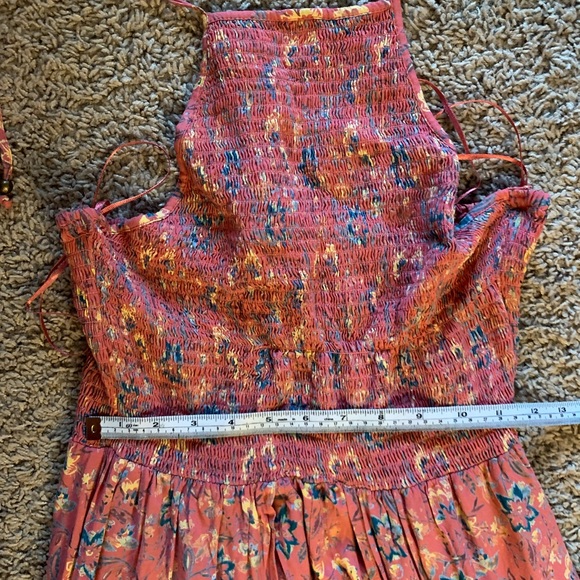 Floral Split front romper with attached shorts and smock halter top. - Picture 10 of 13